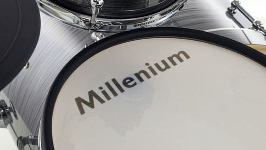 Close-up view of a Millenium electronic drum pad, highlighting the logo and surface design for Millenium MPS-1000 drum pad upgrade.